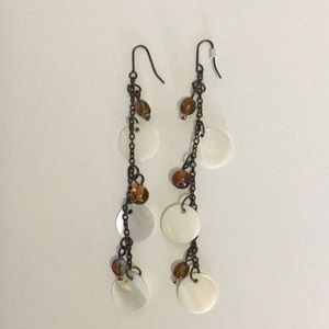 Long cream and brown toned earrings